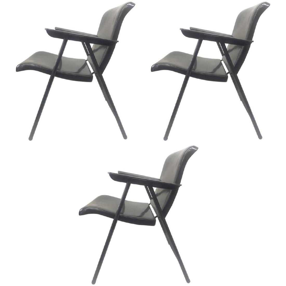 Set of 3 Folding Metal Chairs by Russel Wright: These chairs have been powder coated in a gun finish. They fold, are very comfortable and light. They can find their place in a garden or an office anywhere because they are very stylish. Original Ret