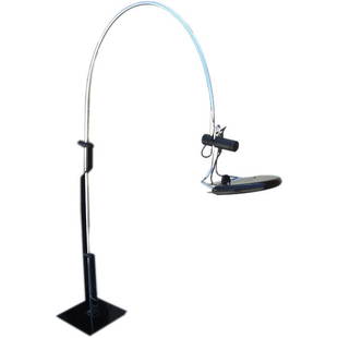 Dutch Arch Floor Lamp by Artimeta Soest: This Dutch arc floor lamp from the 1970s by Artmeta Soest is black enameled metal and chrome. The shade is adjustable in all directions. Height: 78.75" Width: 64"