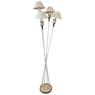 Maison Lunel Floor Lamp: 1950s floor lamp designed by Maison Lunel, Paris, France. Each lamp is comprised of four lamp holders in brass cages supported by cone-shaped red plexiglass supports. The white circular metal bases