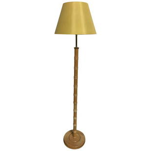 Satin Yellow Shade Floor Lamp: A floor lamp with a satin yellow paper lamp shade, a detailed, spindled cylinder wood post and a circular wooden base._x000D_ Dimensions without lampshade: 10.5". Height: 60.75" Width: 14.75" Depth: