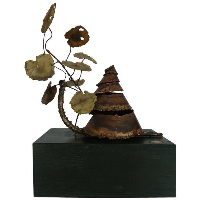 Sculpture by Curtis Jere: brass sculpture by Curtis Jere on a wooden base. Width: 9" Depth: 5.50" Height: 12"