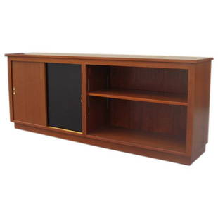 Danish Modern Cabinet / Bookcase in Teak: This mid-century modern storage unit features an open shelf on one side and a cabinet with sliding doors on the other. The Danish case piece is made of teak with one of the cabinet doors lacquered