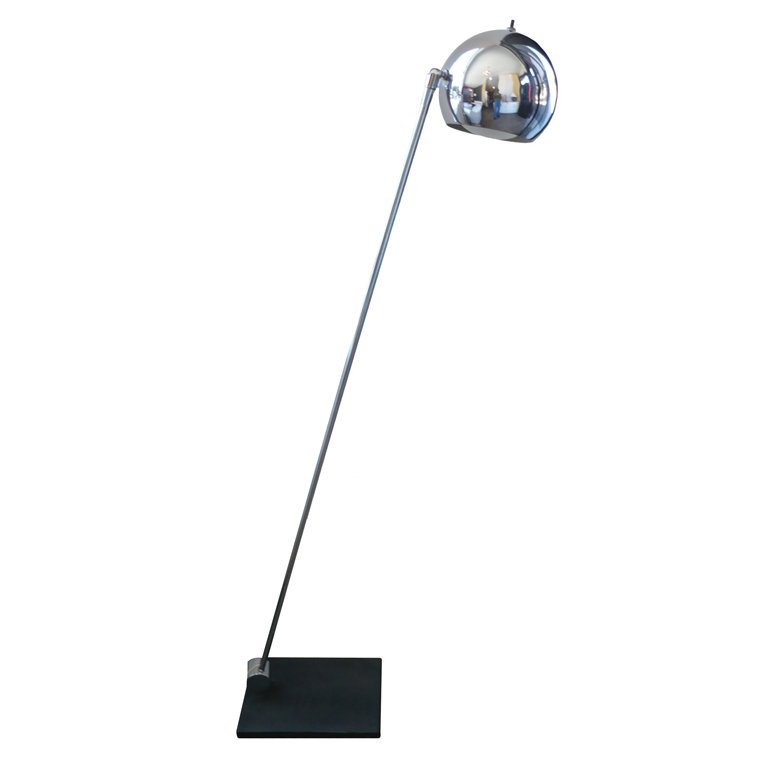 Adjustable Chrome Floor Lamp by Robert Sonneman: This 1960s chrome floor lamp features a globular head that moves up and down. The body of the piece swivels from the black base. 55 in. H x 9 in. W x 15 in. D