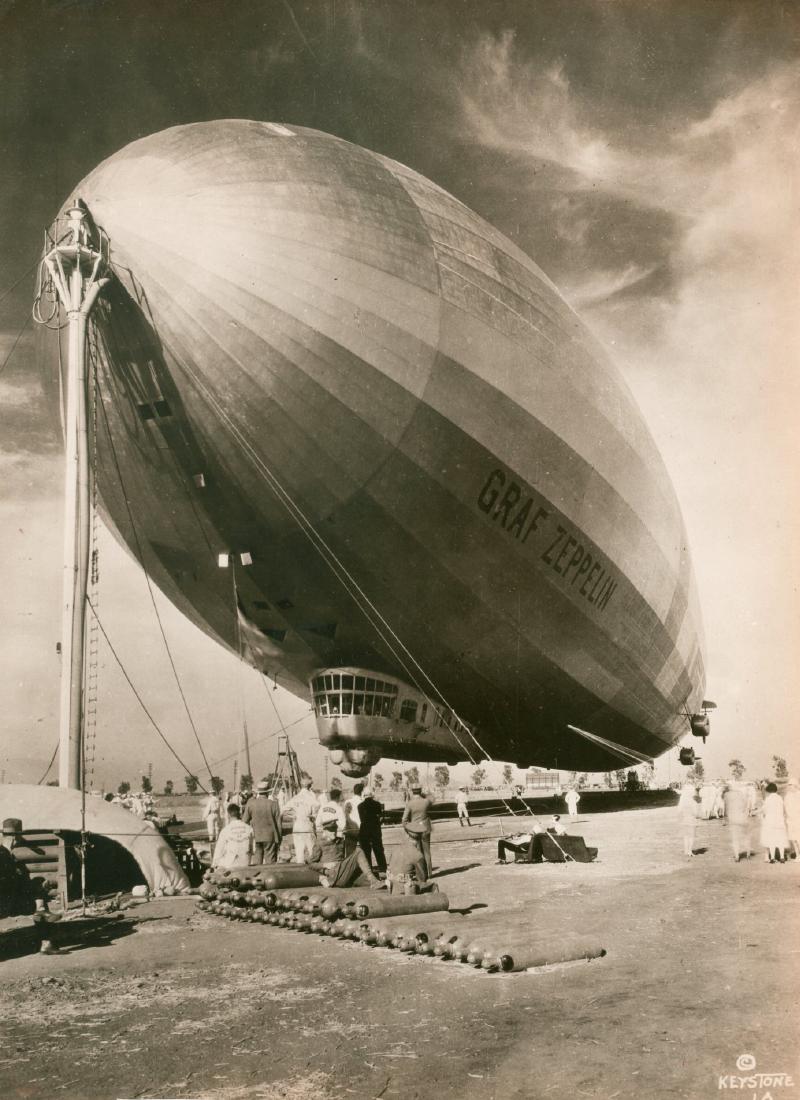 Graf Zeppelin at Mines Field, Los Angeles, c1930: Graf Zeppelin at Mines Field, Los Angeles returning from itÍs round the world flight. c1930. Very good contrast and tonality. Ewing Galloway Agency. 9.5 x 7 in.
