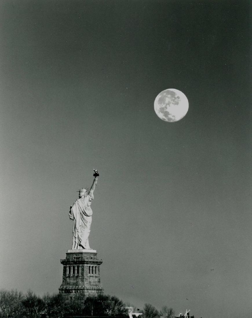 Statue of Liberty, New York: Statue of Liberty, New York. Unknown photographer. Glossy silver print with rich tonality. Stock photo library stamps on verso. 9.25 x 7.5 in. 24 x 119cm.