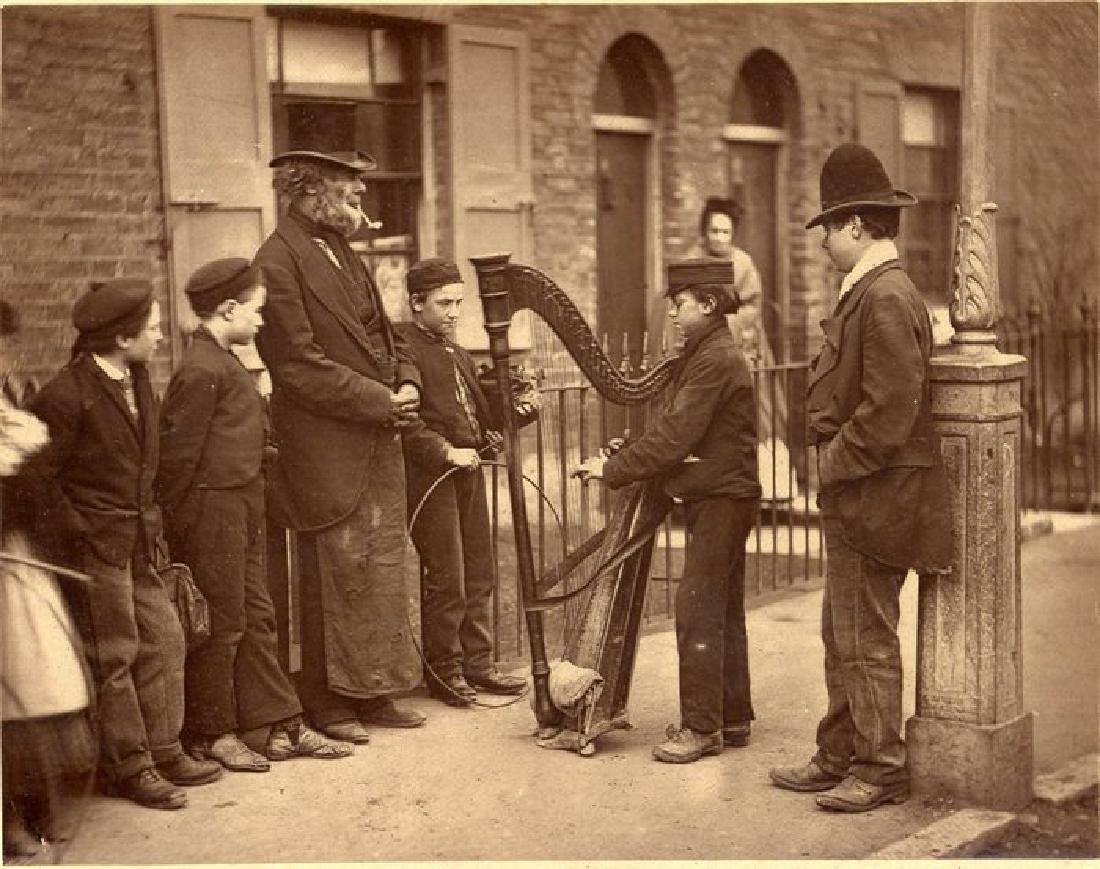 Carbon print - Italian Street Musicians. c1877: Carbon print (Woodburytype) - Italian Street Musicians. C1877. From John Thomson's famous series Street Life in london. 1877. Exceptional contrast and tonality. 3.5 x 4.5 in. 9 x 11.5 cm. Unless other