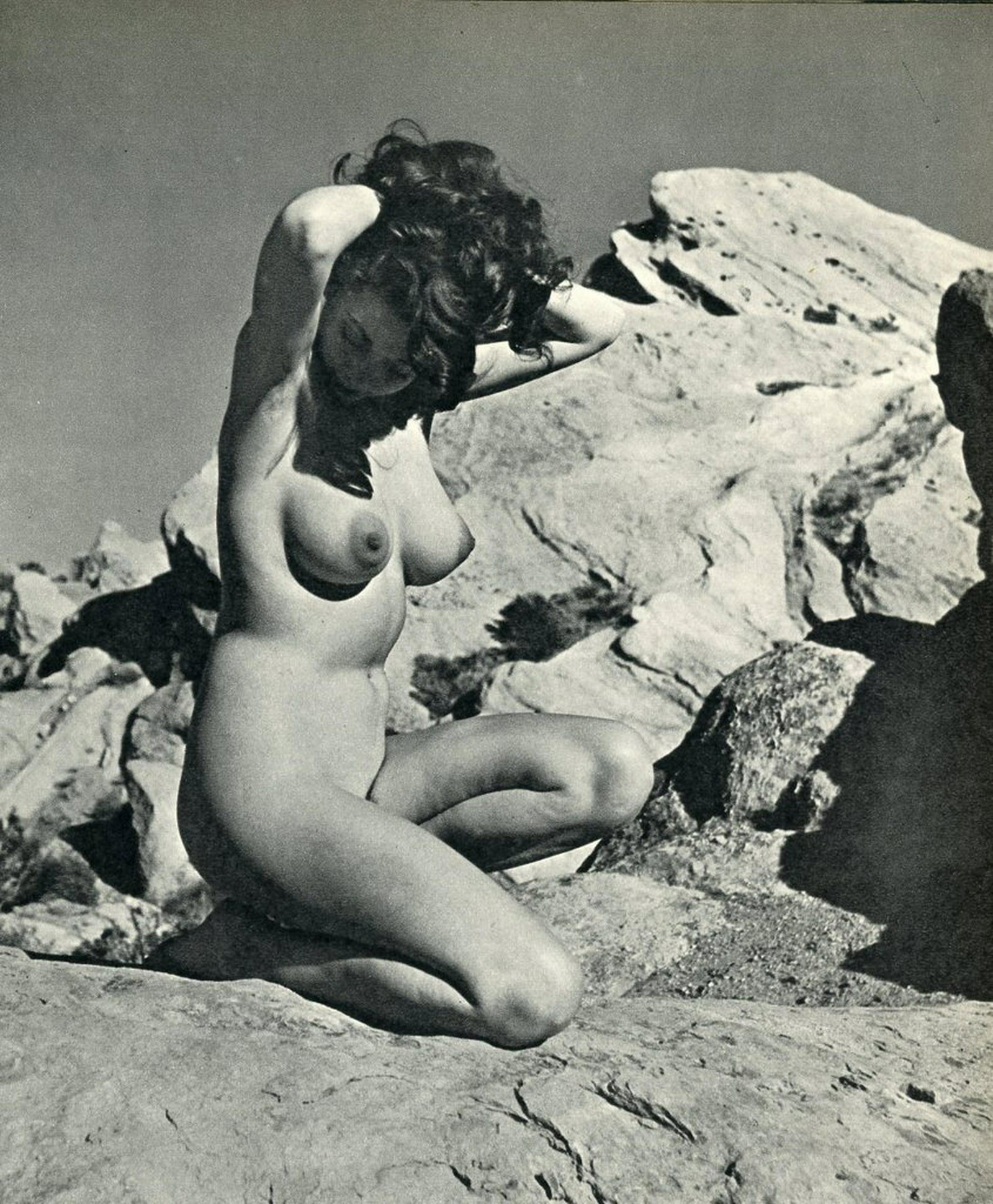 Nude by Andre de Dienes. C1956: Nude by Andre de Dienes. C1956. American-Hungarian photographer famous for nude photography and photographs of a young Marilyn Monroe. Photogravure from The Nude. 7.875 x 8.25 in. Reverse: 10.75 x 8.2