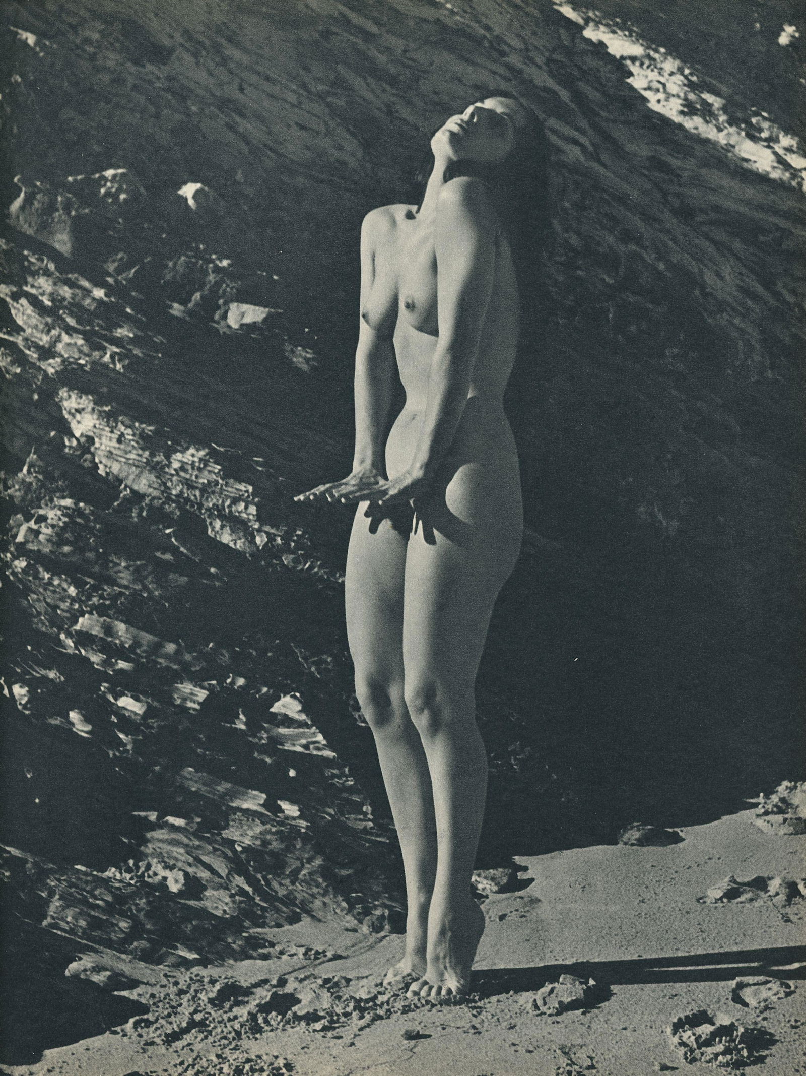 Nude by Andre de Dienes. C1956: Nude by Andre de Dienes. C1956. American-Hungarian photographer famous for nude photography and photographs of a young Marilyn Monroe. Photogravure from The Nude. 8.5 x 8.25 in. Reverse: 8.5 x 8.25 in