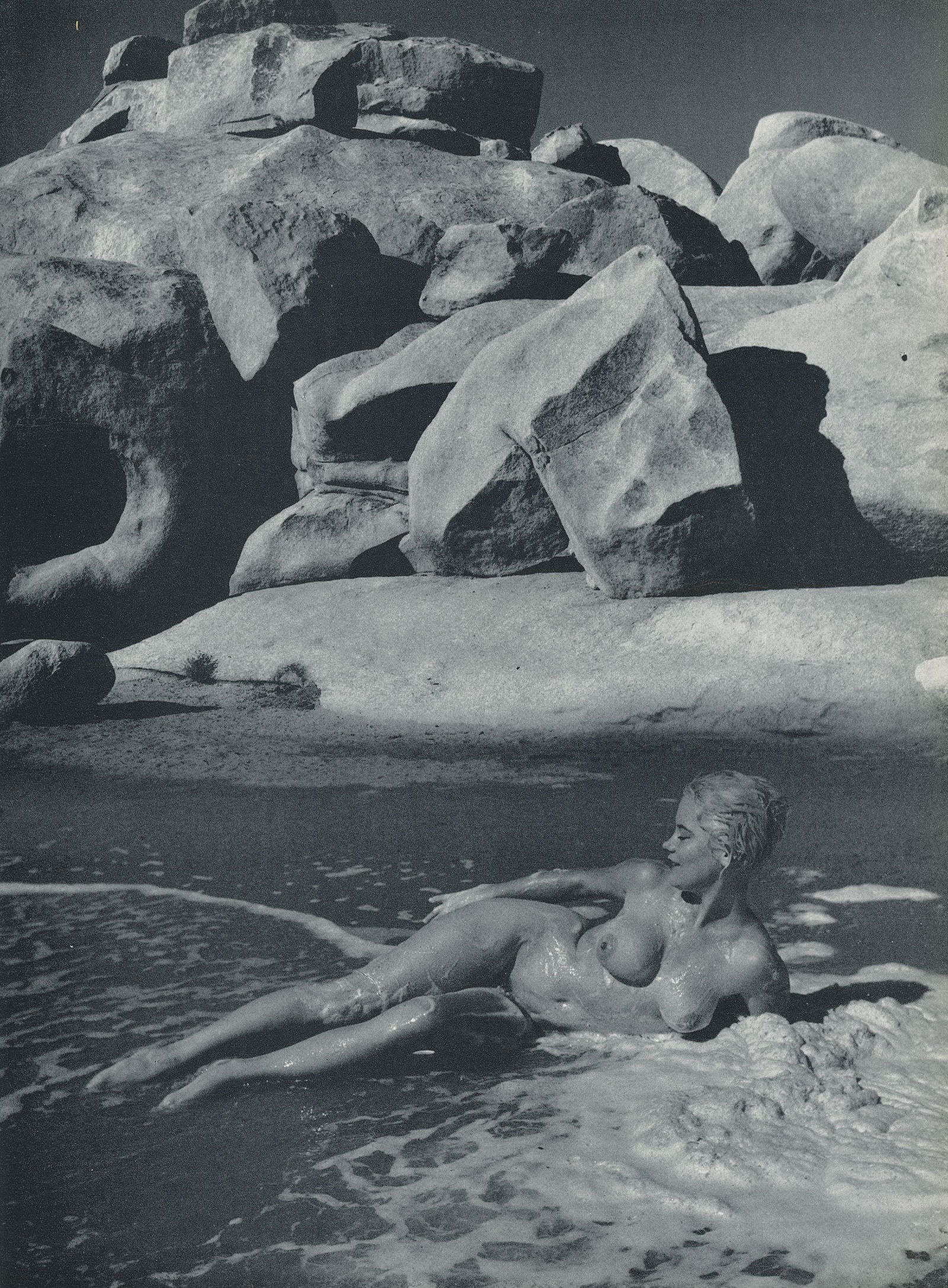 Nude by Andre de Dienes. C1962: Nude by Andre de Dienes. C1962. American-Hungarian photographer famous for nude photography and photographs of a young Marilyn Monroe. From Best Nudes. 10.875 x 8.25 in. Rev: 10.875 x 8.25 in.