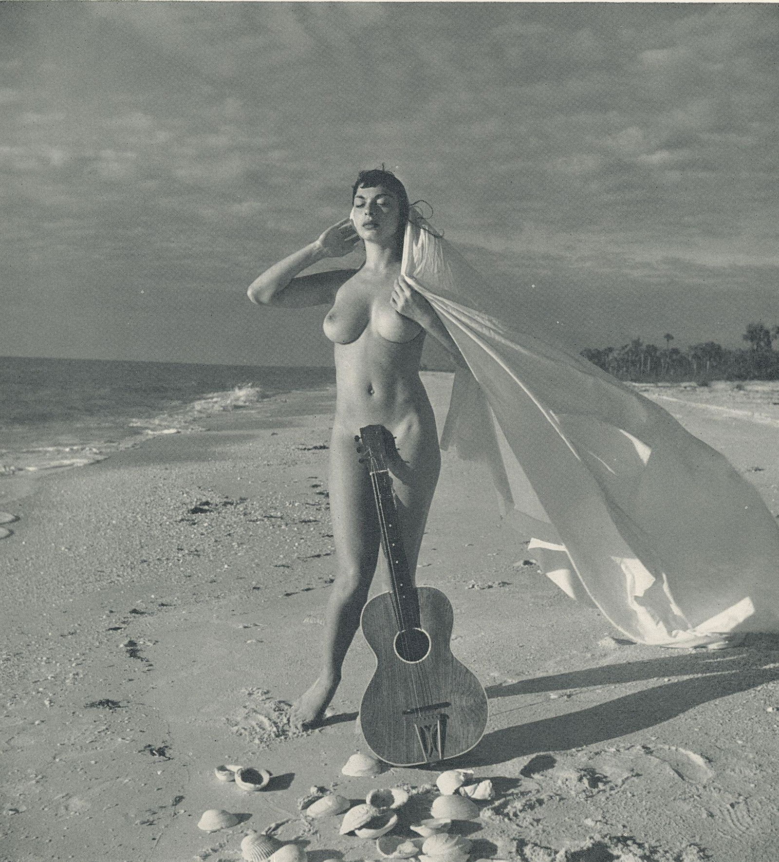 Nude by Andre de Dienes. C1958: Nude by Andre de Dienes. C1958. American-Hungarian photographer famous for nude photography and photographs of a young Marilyn Monroe. From Nude Pattern. 6.5 x 6 in. rev: 6.5 x 6.5 in