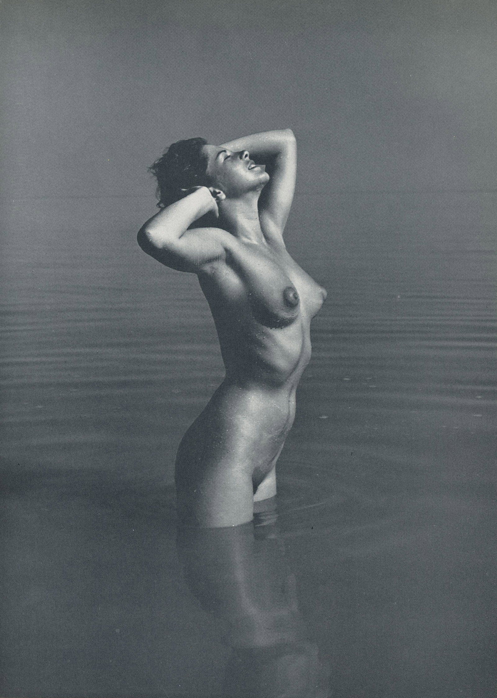 Nude by Andre de Dienes. C1962: Nude by Andre de Dienes. C1962. American-Hungarian photographer famous for nude photography and photographs of a young Marilyn Monroe. From Best Nudes. 10.9 x 7.625 in. Rev: 10.9 x 8.75 in.
