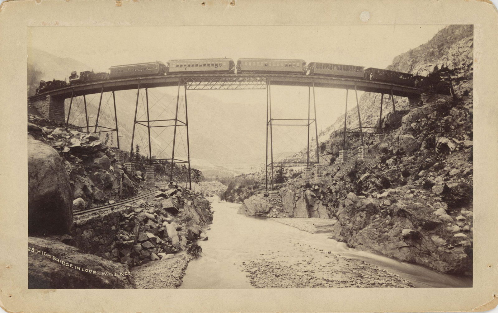High Bridge in Loop. C.C.R.R. C1890: High Bridge in Loop. Colorado Central Railroad. C1890. Good contrast and tonality. Original photograph by William Henry Jackson. 4.125 x 7 in. on card 5 x 8 in. Excellent backmark of W.H.Jackson Publi
