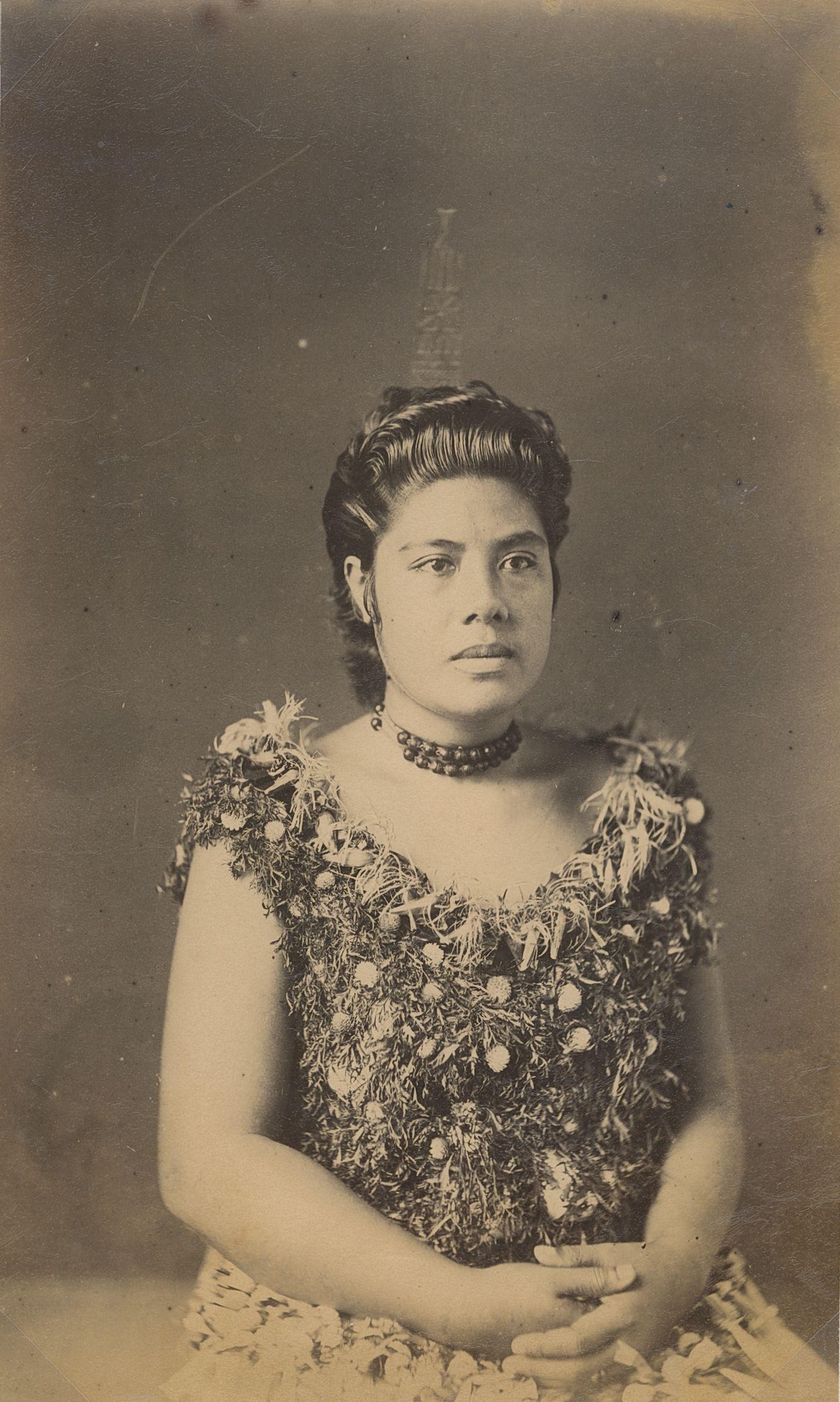 SAMOA. High Rank Samoan Lady wearing coconut comb,: High Rank Samoan Lady wearing coconut comb, c1893. Very good contrast and tonality, bottom edge fading. Attributed to John Davis. 8 x 4.875 in. 20.32 x 12.38 cm