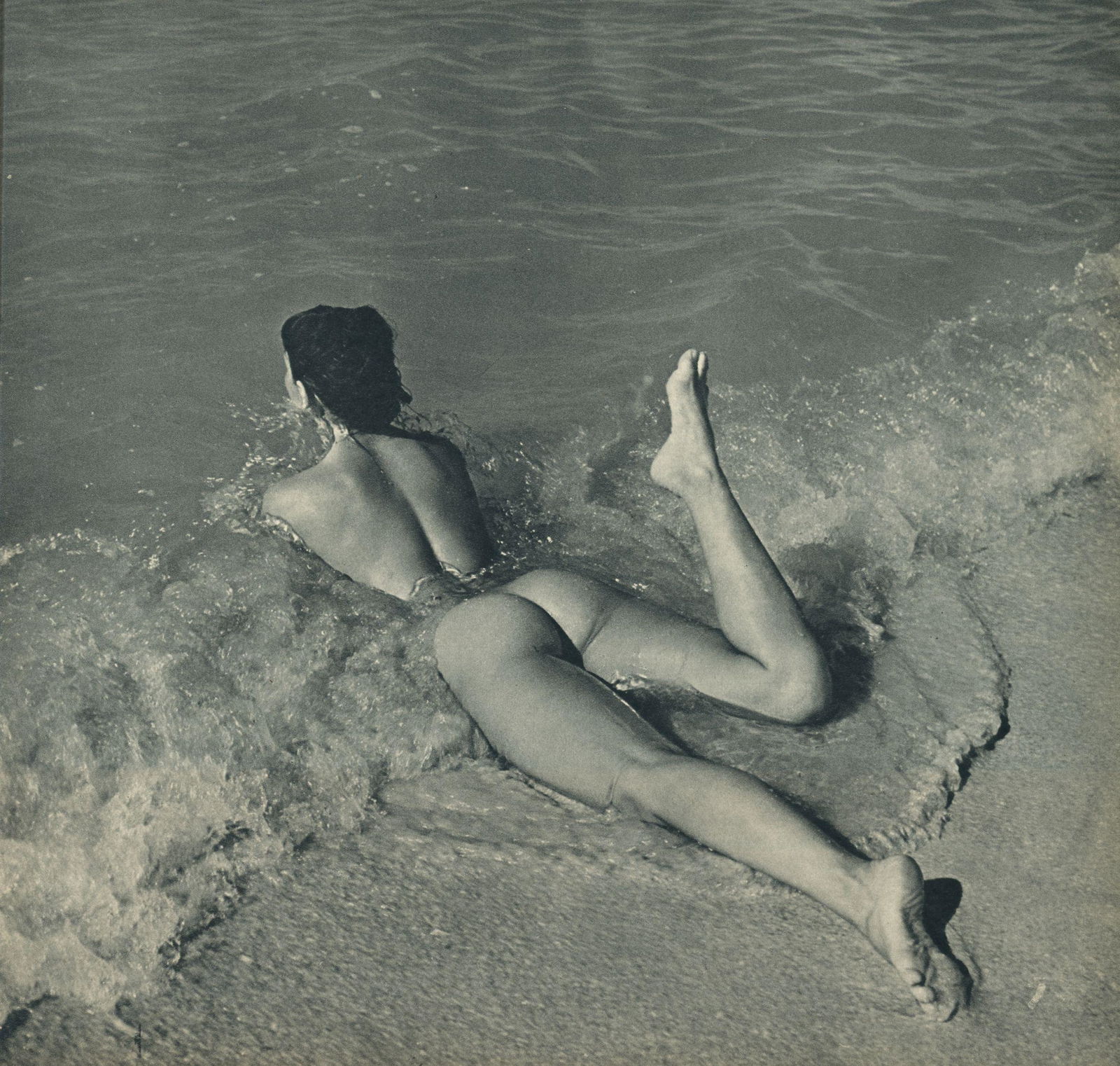 Nude by Andre de Dienes. C1956: Nude by Andre de Dienes. C1950. American-Hungarian photographer famous for nude photography and photographs of a young Marilyn Monroe. Photogravure from The Nude. 8.25 x 8.25 in. Rev: 8.25 x 8.25 in.