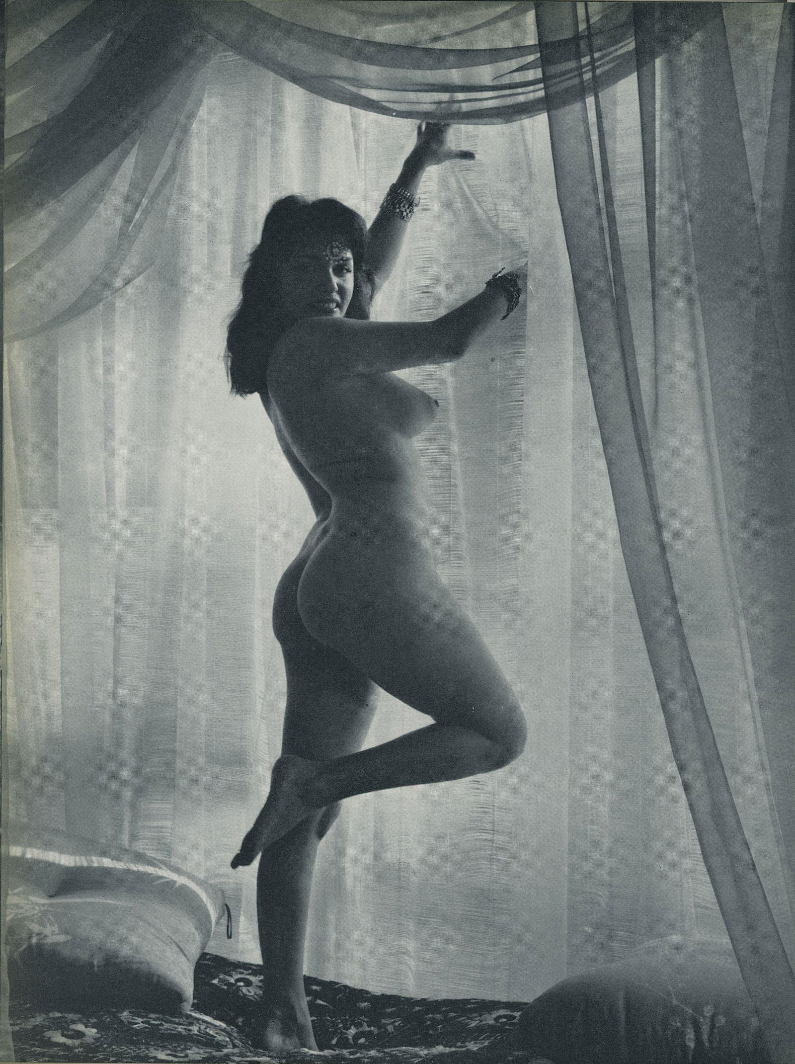 Nude by Andre de Dienes. C1962: Nude by Andre de Dienes. C1958. American-Hungarian photographer famous for nude photography and photographs of a young Marilyn Monroe. From Best Nudes. 10.9 x 8.25 in. Rev: 10.9 x 8.75 in.