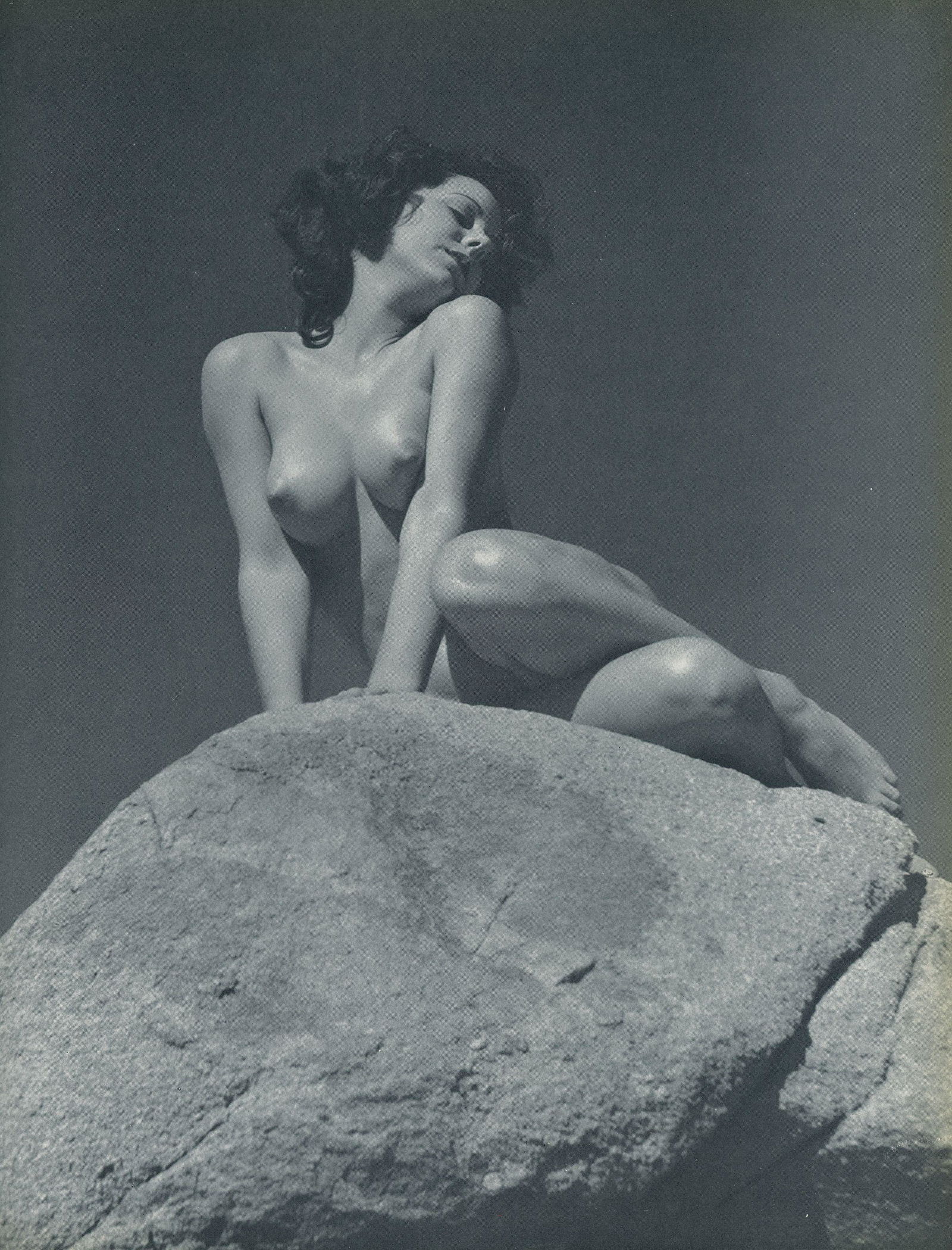 Nude by Andre de Dienes. C1962: Nude by Andre de Dienes. C1958. American-Hungarian photographer famous for nude photography and photographs of a young Marilyn Monroe. From Best Nudes. 10.9 x 8.75 in. Rev: 10.9 x 8.75 in.