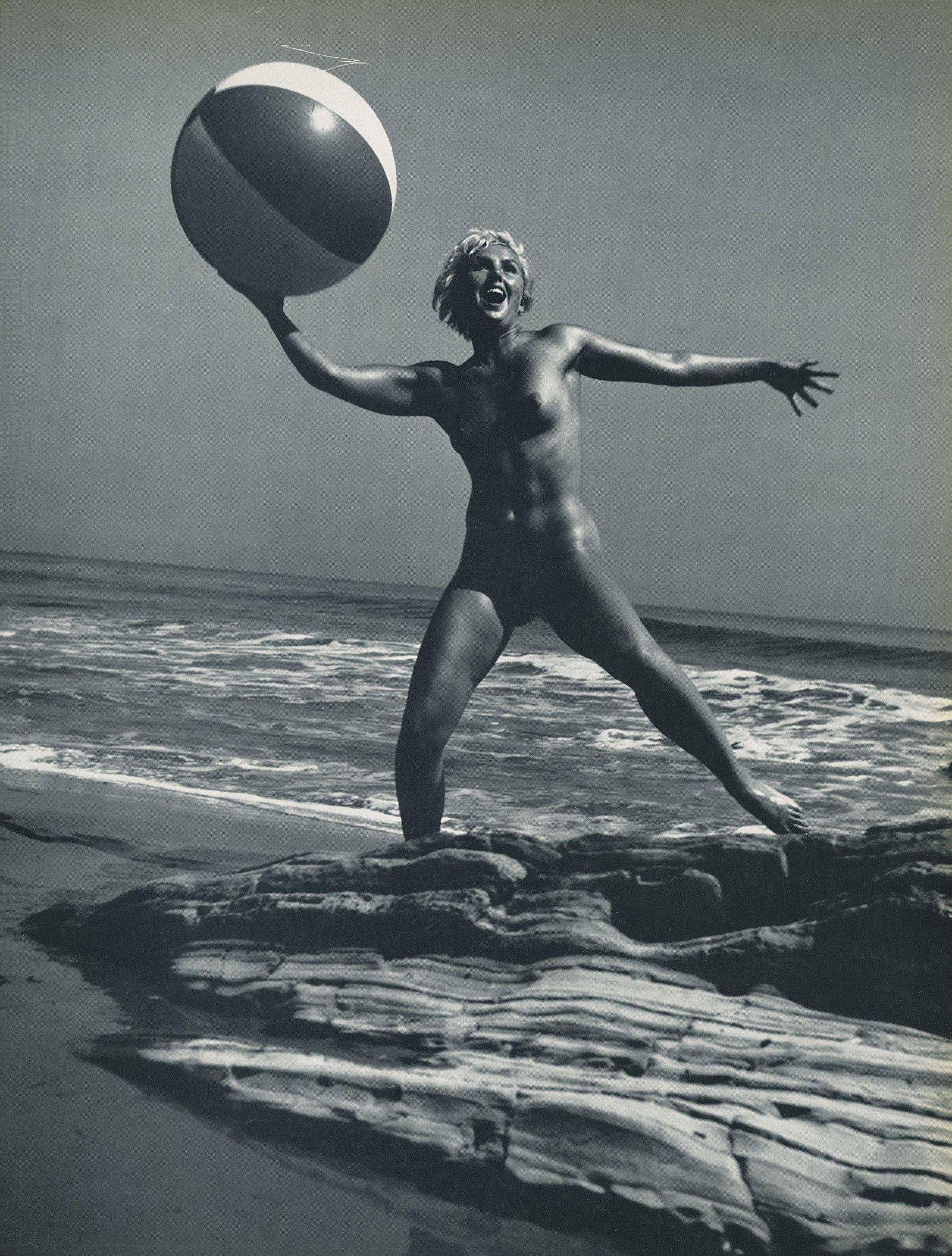 Nude by Andre de Dienes. C1962: Nude by Andre de Dienes. C1958. American-Hungarian photographer famous for nude photography and photographs of a young Marilyn Monroe. From Best Nudes. 10.9 x 8.25 in. Rev: 10.9 x 8 in.