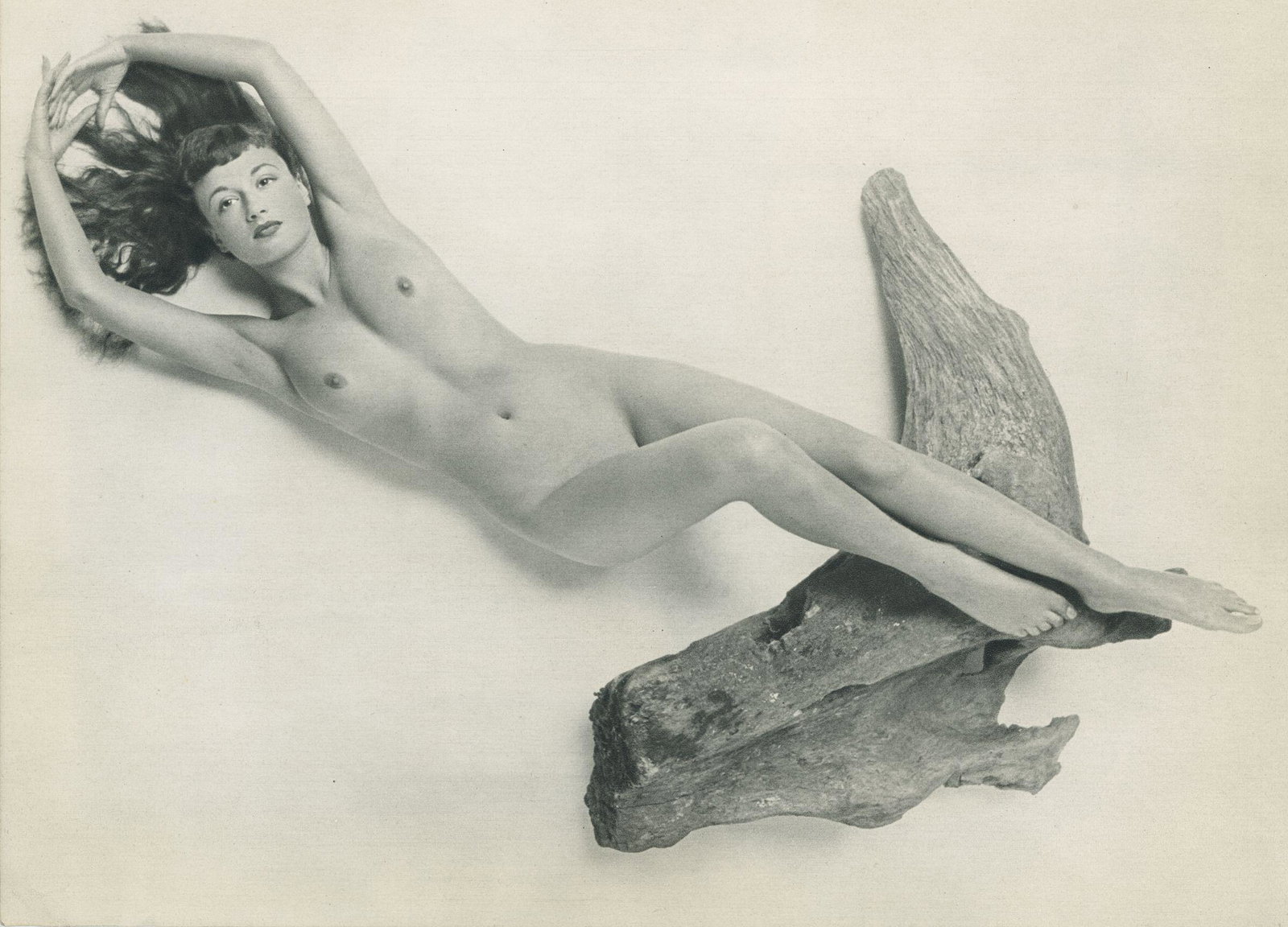 Nude by Zoltan Glass. C1950: Nude by Zoltan Glass. C1950. ZoltÃ¡n Glass was a Hungarian photographer who was one of the renown photographers of the 20th century. 8.5 x 11.5 in. Rev: 11.25 x 8.25 in.
