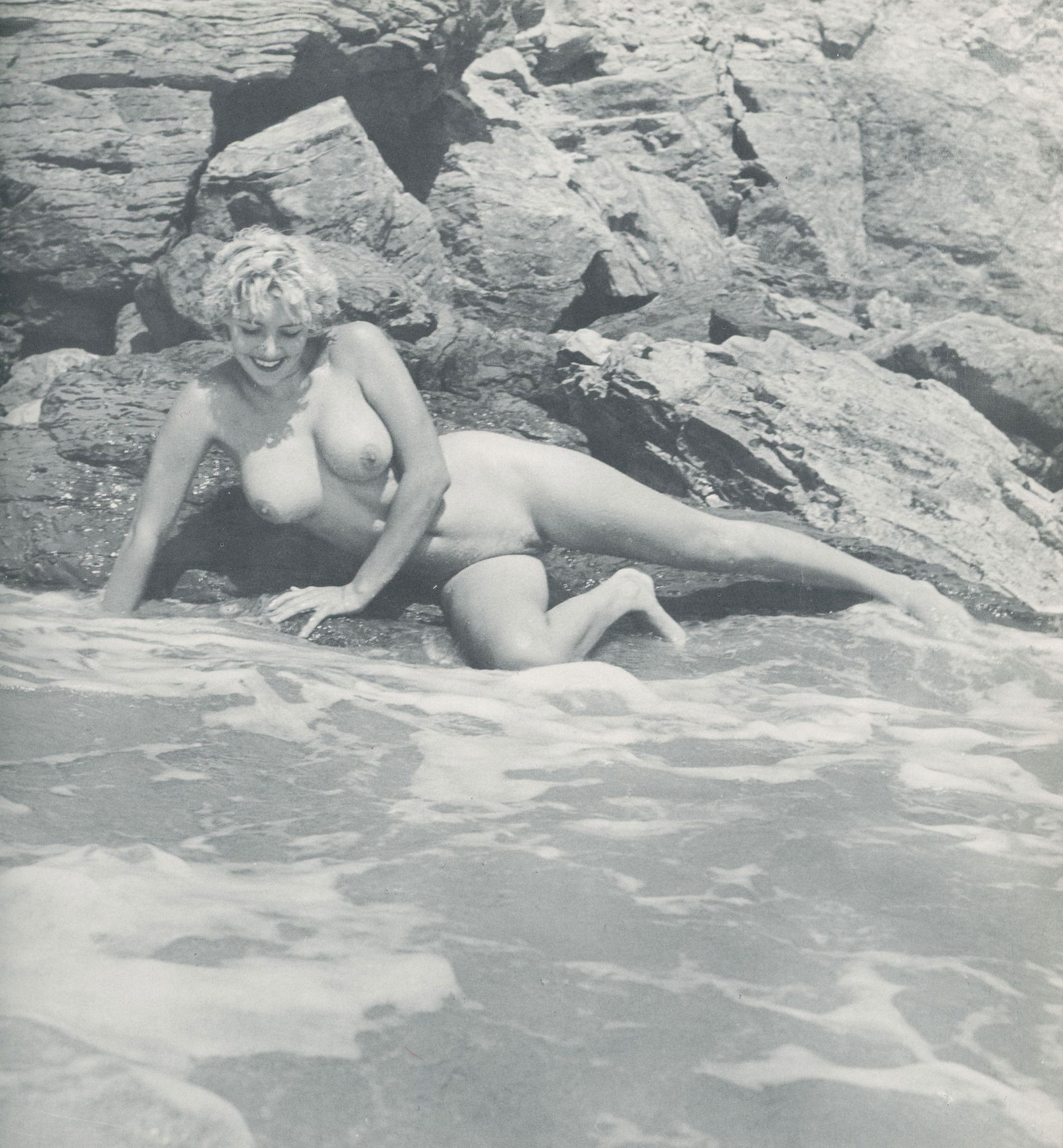 Nude by Andre de Dienes. C1966: Nude by Andre de Dienes. C1966. American-Hungarian photographer famous for nude photography and photographs of a young Marilyn Monroe. 9.5 x 8.75 in. Rev: 9.25 x 8.75 in.