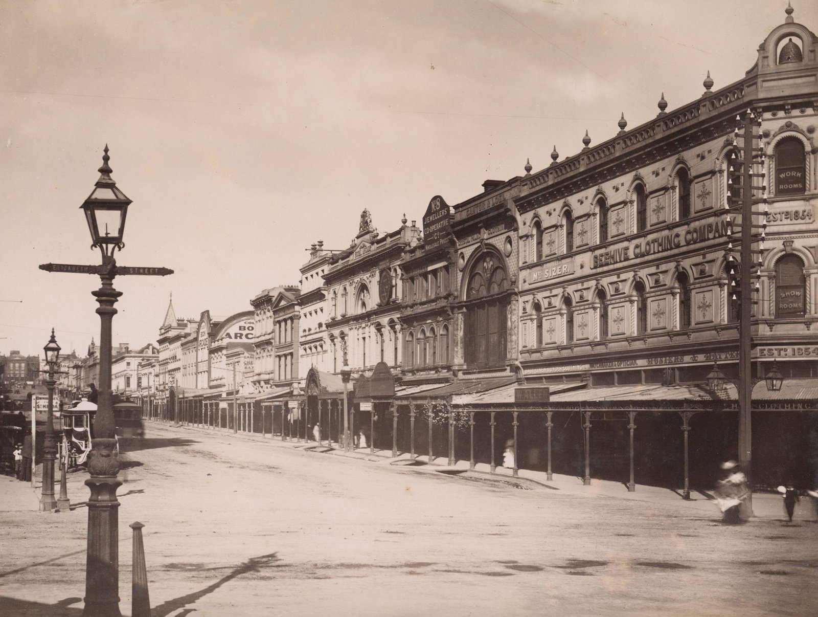 AUSTRALIA. Beehive Building, corner of Elizabeth Street and Bourke. C1880.: Beehive Building, corner of Elizabeth Street and Bourke looking south, Melbourne. c1880. Make a great pairing with lot 1004. Very good contrast and tonality, minor edge fading . Unknown photographer. 