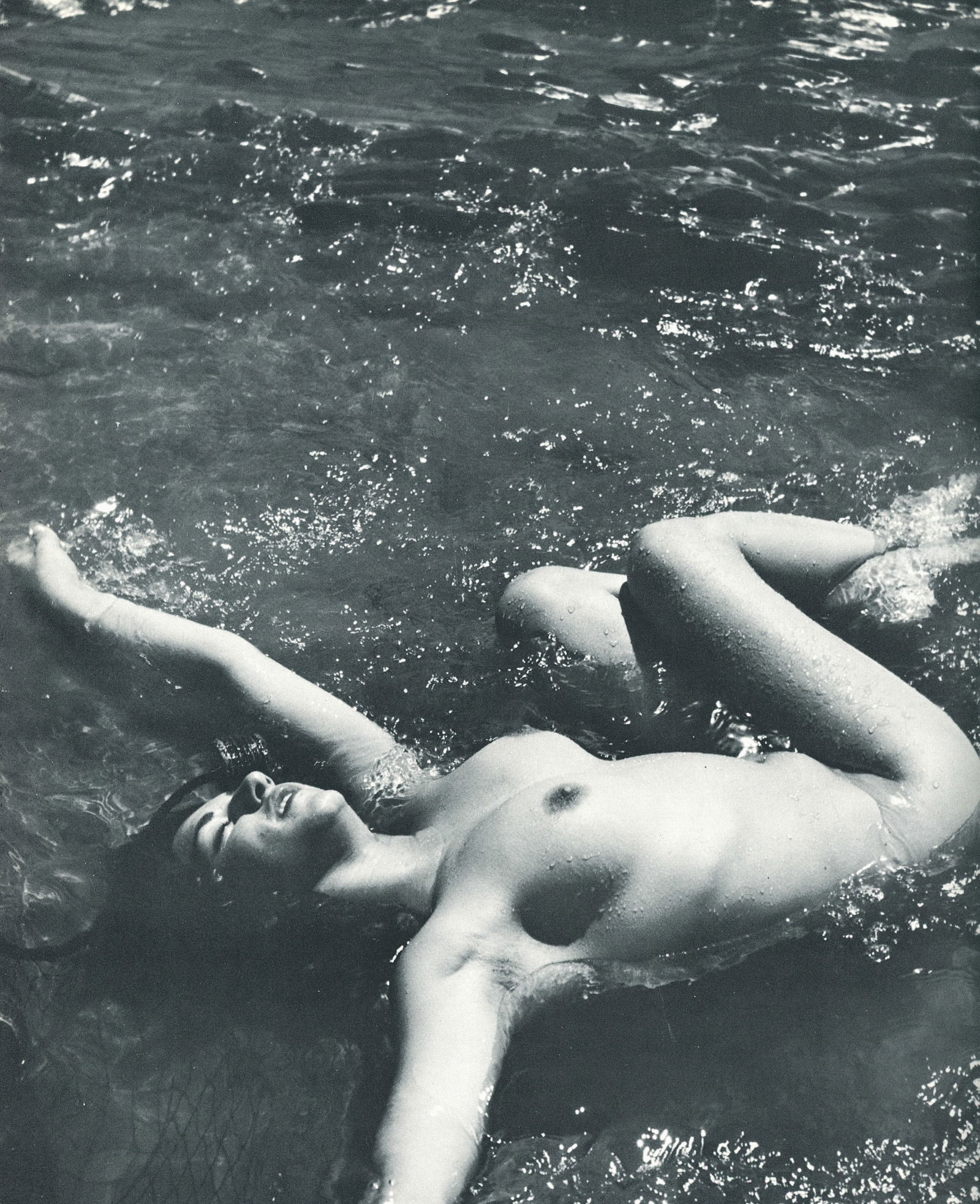 Nude by Andre de Dienes. C1966: Nude by Andre de Dienes. C1966. American-Hungarian photographer famous for nude photography and photographs of a young Marilyn Monroe. 10 x 8.5 in. Rev: 9.75 x 8.25 in.