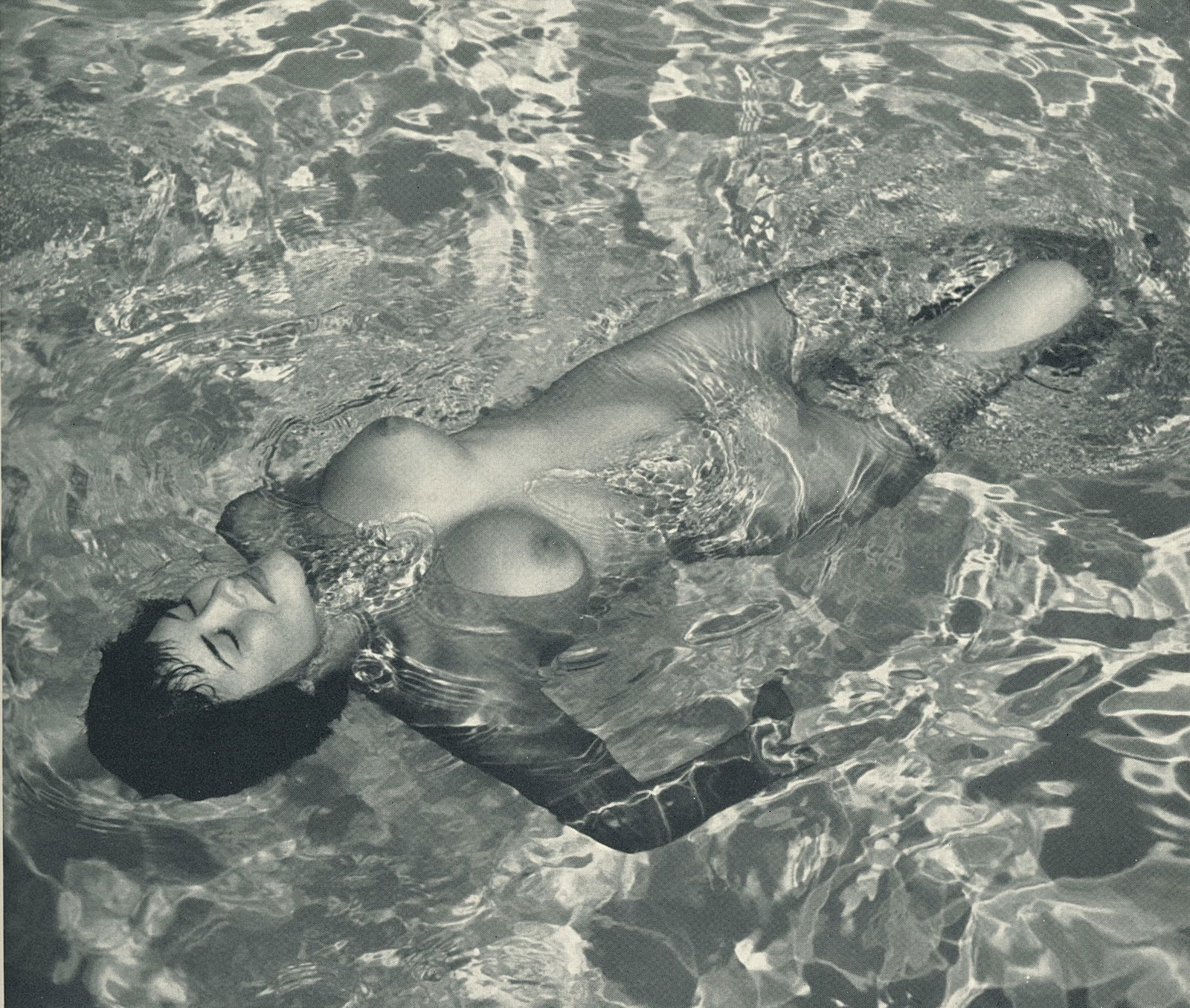 Nude by Andre de Dienes. C1958: Nude by Andre de Dienes. C1958. American-Hungarian photographer famous for nude photography and photographs of a young Marilyn Monroe. 6 x 7.5 in. Rev: 5.75 x 7.5 in.