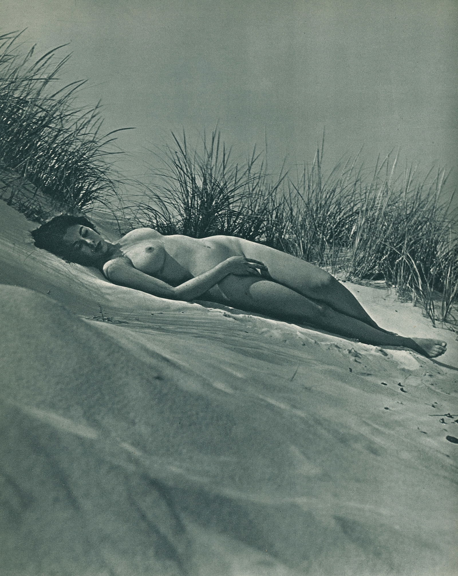 Nude by André de Dienes. C1960: Nude by André de Dienes. C1960. American-Hungarian photographer famous for nude photography and photographs of a young Marilyn Monroe. Photogravure from The Nude. 10.5 x 9 in. Reverse: 11.75 x 9 in.