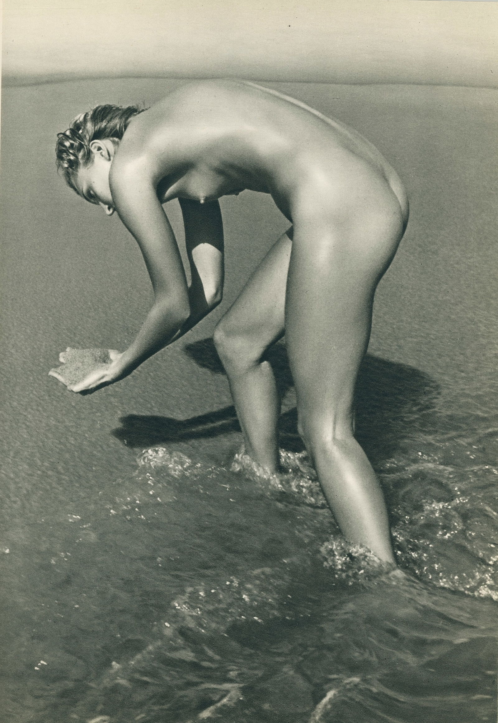 Nude by André de Dienes. C1960: Nude by André de Dienes. C1960. American-Hungarian photographer famous for nude photography and photographs of a young Marilyn Monroe. Photogravure from The Nude. 11.75 x 8.125 in. Reverse: 9.5 x 8 i