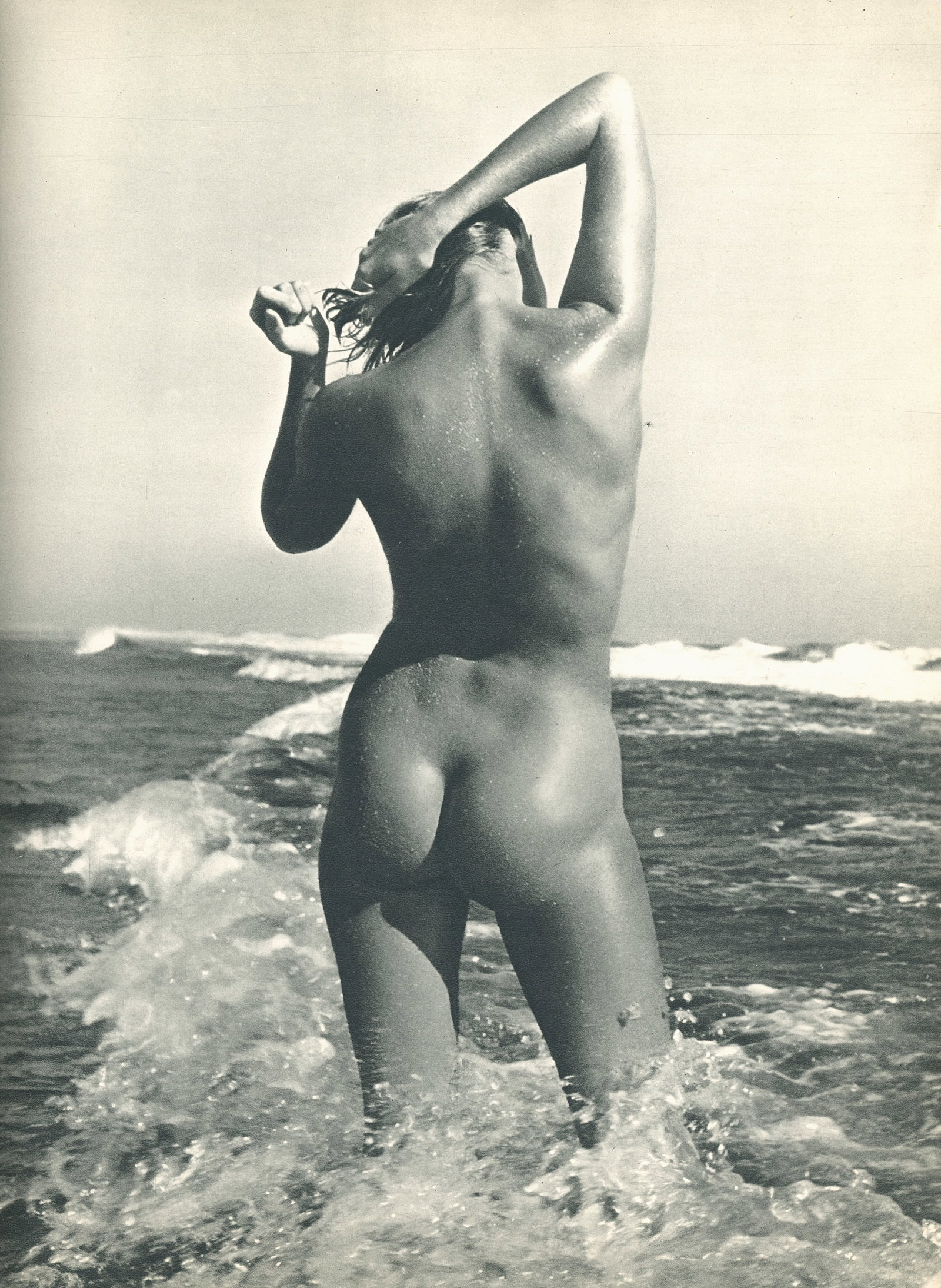Nude by Andre Dienes. C1959: Nude by Andre de Dienes. (1913 - 1985). American-Hungarian photographer famous for nude photography and photographs of a young Marilyn Monroe. 11.75 x 8.5 in. Reverse: 11.75 x 8 in.