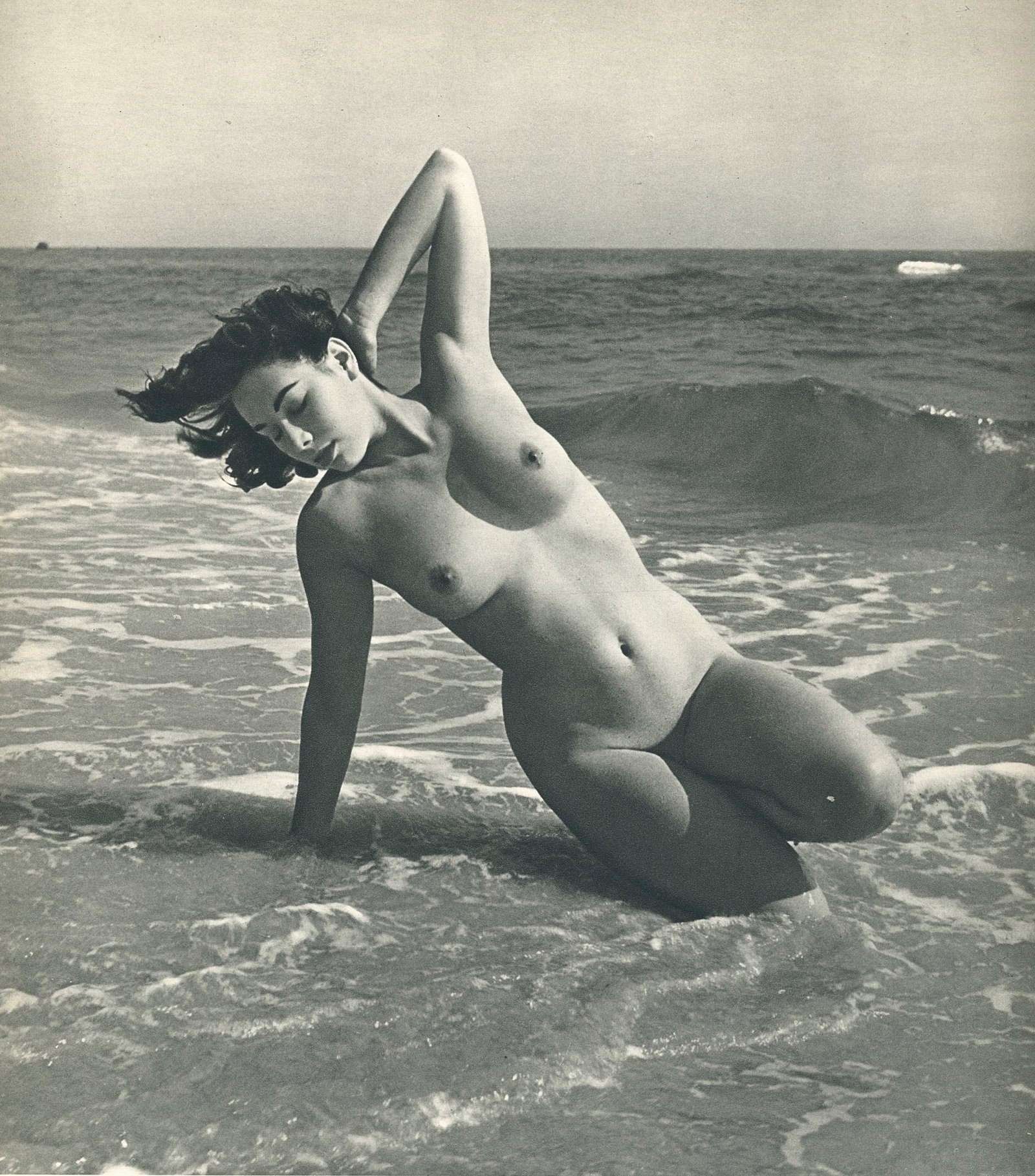 Nude by Andre Dienes. C1959: Nude by Andre de Dienes. (1913 - 1985). American-Hungarian photographer famous for nude photography and photographs of a young Marilyn Monroe. 9.75 x 9 in. Reverse: 9.75 x 9 in.