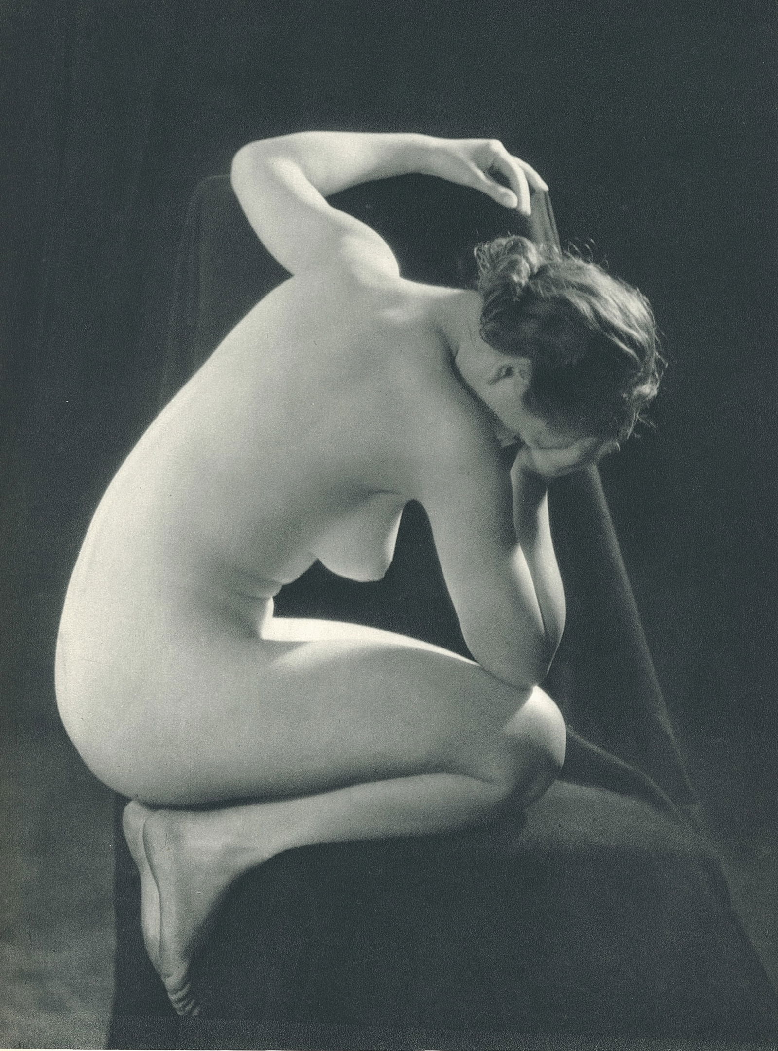 Nude by George Louis Arlaud. C1936: G.L. Arlaud (1869 - 1944) was a French photographer known for his outdoor nude studies he took in the South of France. He settled in La Ciotat in 1942, where he was assassinated in 1944, the day after