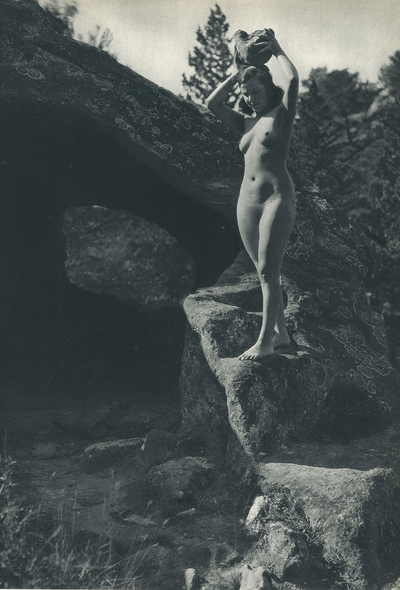Nude by George Louis Arlaud. C1936: G.L. Arlaud (1869 - 1944) was a French photographer known for his outdoor nude studies he took in the South of France. He settled in La Ciotat in 1942, where he was assassinated in 1944, the day after