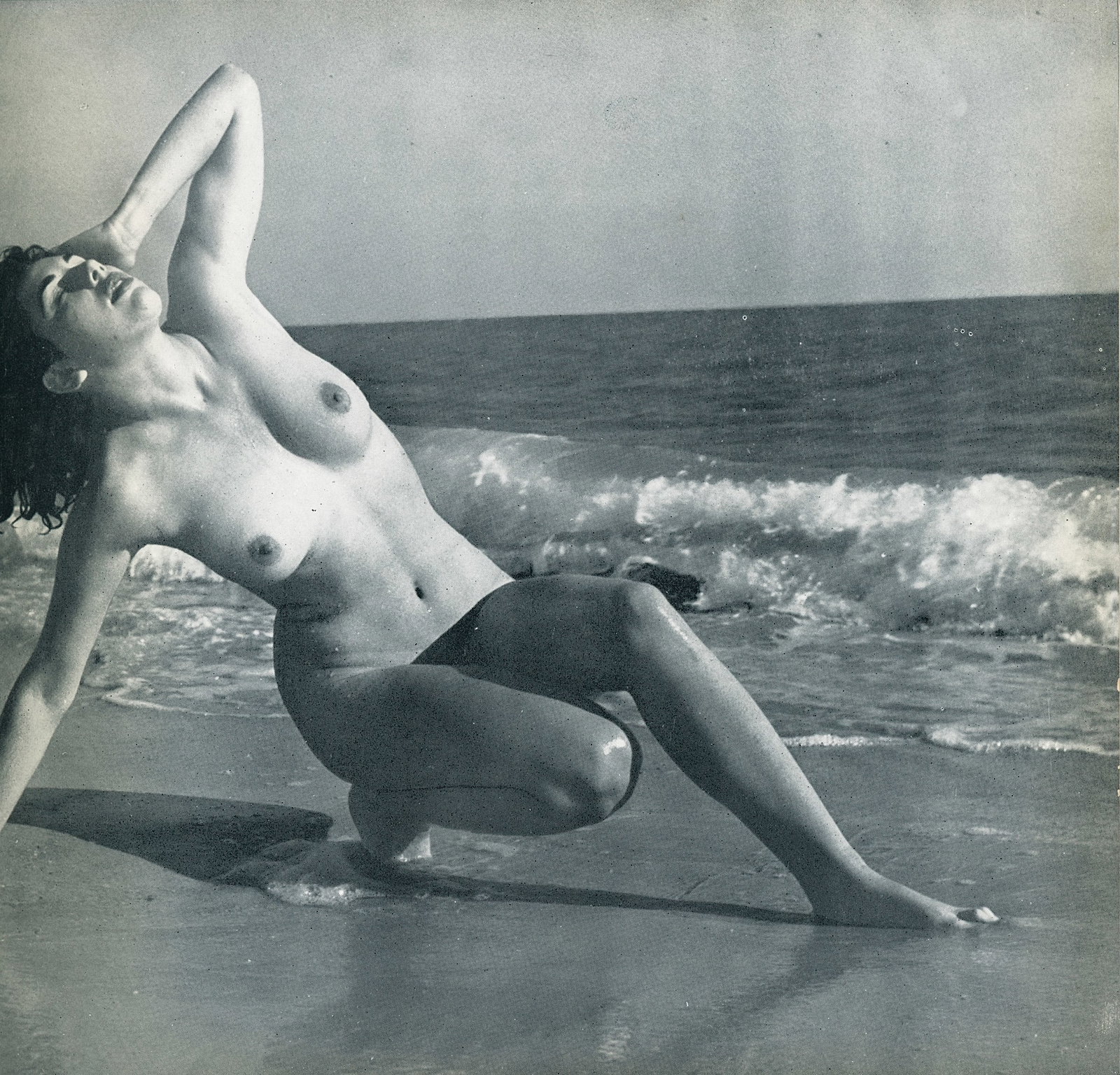 Nude by Andre de Dienes. C1958: Nude by André de Dienes. C1958. American-Hungarian photographer famous for nude photography and photographs of a young Marilyn Monroe. 7.5 x 7.75 in. Reverse: 7.5 x 5.675 in.