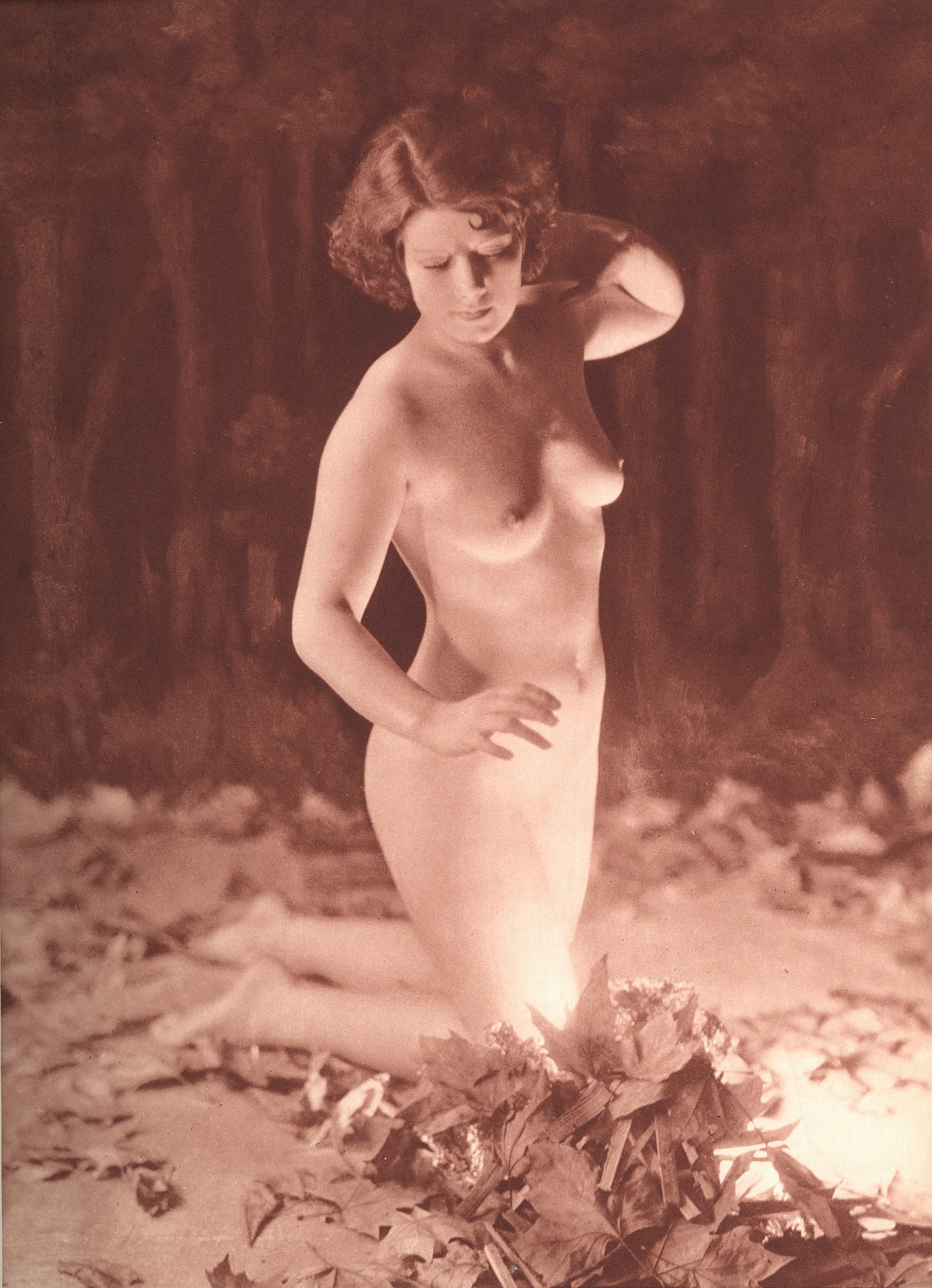 Nude by George Louis Arlaud. C1936: G.L. Arlaud (1869 - 1944) was a French photographer known for his outdoor nude studies he took in the South of France. He settled in La Ciotat in 1942, where he was assassinated in 1944, the day after
