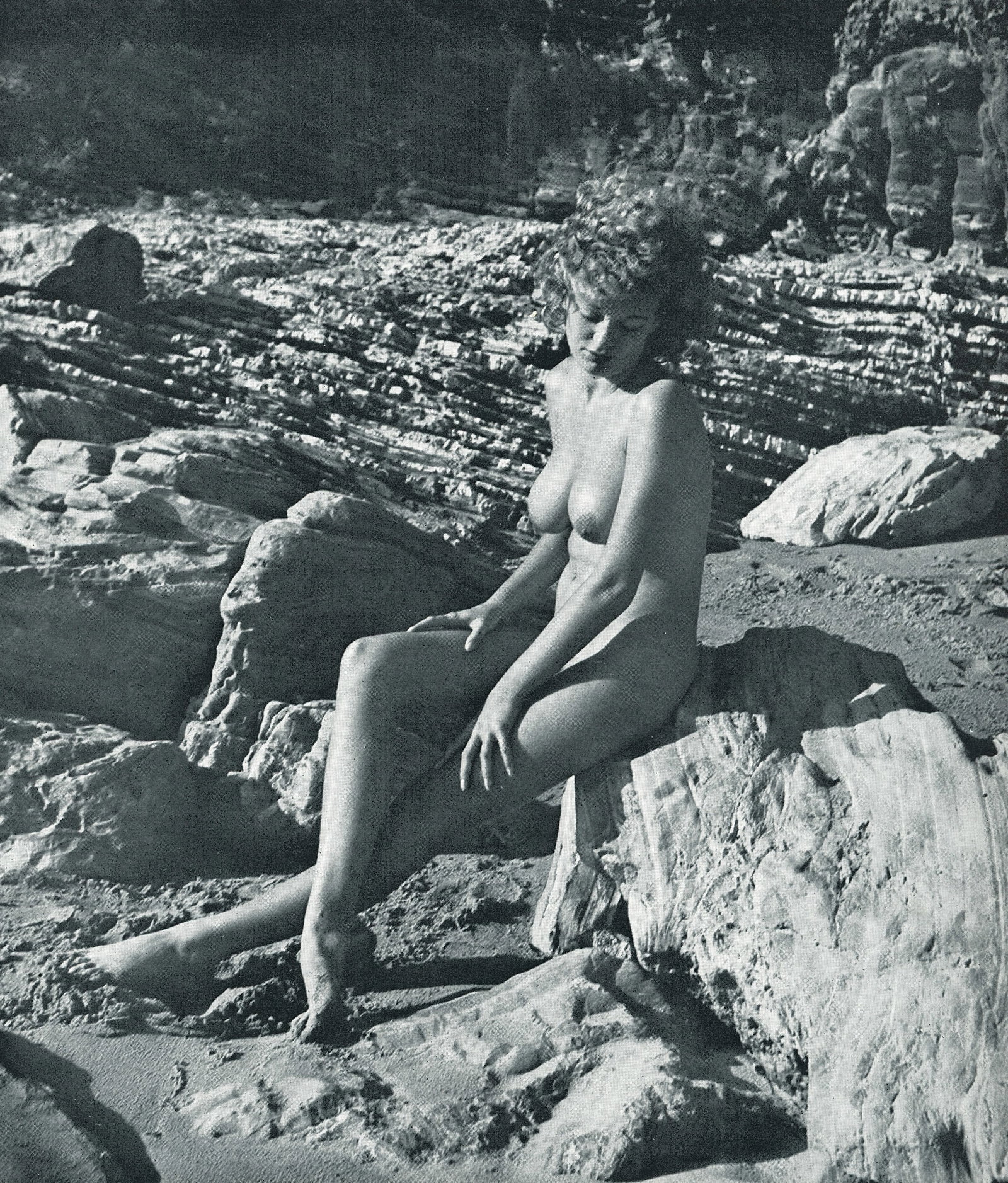 Nude by Andre de Dienes. C1954: From Andre de Dienes Art Collection, printed by Ondori-sha Publishing Co. Dienes was American-Hungarian photographer famous for nude photography and photographs of a young Marilyn Monroe. 9 x 7.75 in.