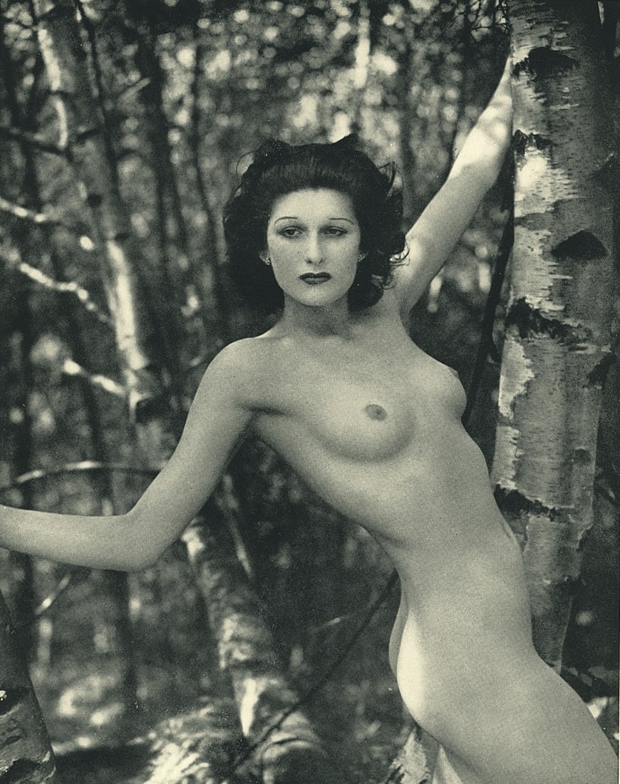 Nude by Roye. C1938: Horace Narbeth (1906 – 2002), known professionally as Roye, was a British photographer. Roye's photograph Tomorrow's Crucifixion, depicting a nude model wearing a gas mask while pinned to a crucifix