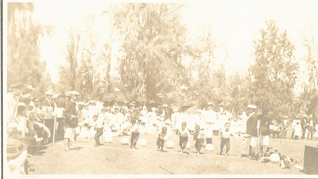 Japanese Sailors hosting Children's Races, Hawaii. c1910 (1 of 1)