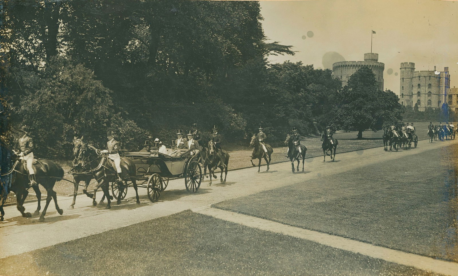King Edward VII on his way to Ascot. C1905.: King Edward VII on his way to Ascot. C1905. Windsor Castle in the background. Good contrast and tonality. Unidentified photographer. 6.75 x 11.125 in. Reverse: The return of the C.S.Vs from the Boer