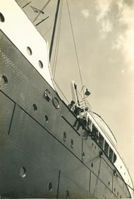 SHIPS. Looking up the side of the "Conte Biancamano". C1925
