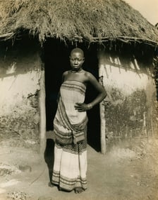 Uganda Lady outside her Hut. c1925