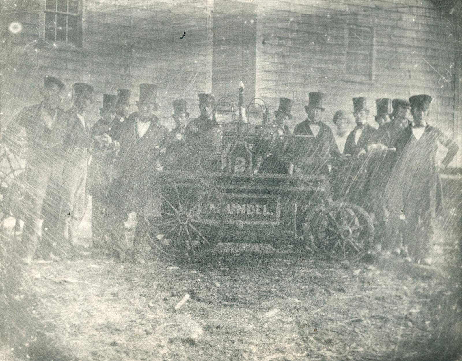 Photograph of a daguerreotype of the Arundel Engine Co. 1850: Photograph of a daguerreotype of the Arundel Engine Co. 1850. 7.5 x 9.375 in.