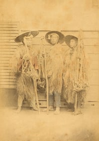 JAPAN. Three Men in Straw Raincoats. c1890