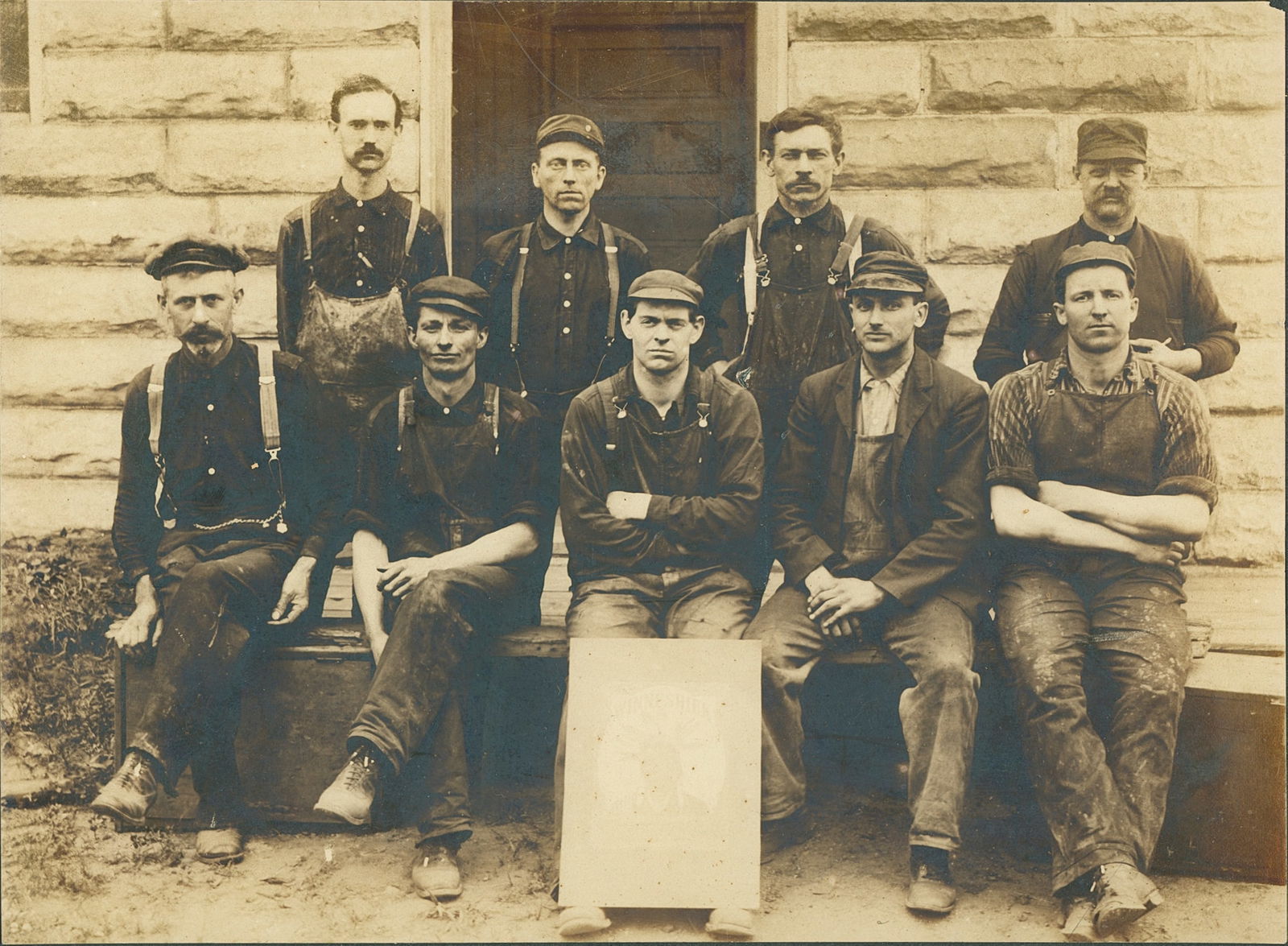 New York Workmen honoring a dead colleague. c1920: Group of New York Workmen honoring a dead colleague. C1920. By Bangert, North Collins, NY. 6 x 8 in.