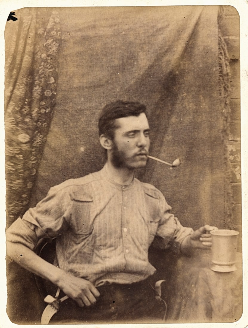 Young Man having a Drink and a Pipe. c1890: Young Man having a Drink and a Pipe. C1890. Fair contrast and tonality. 3.875 x 3 in.