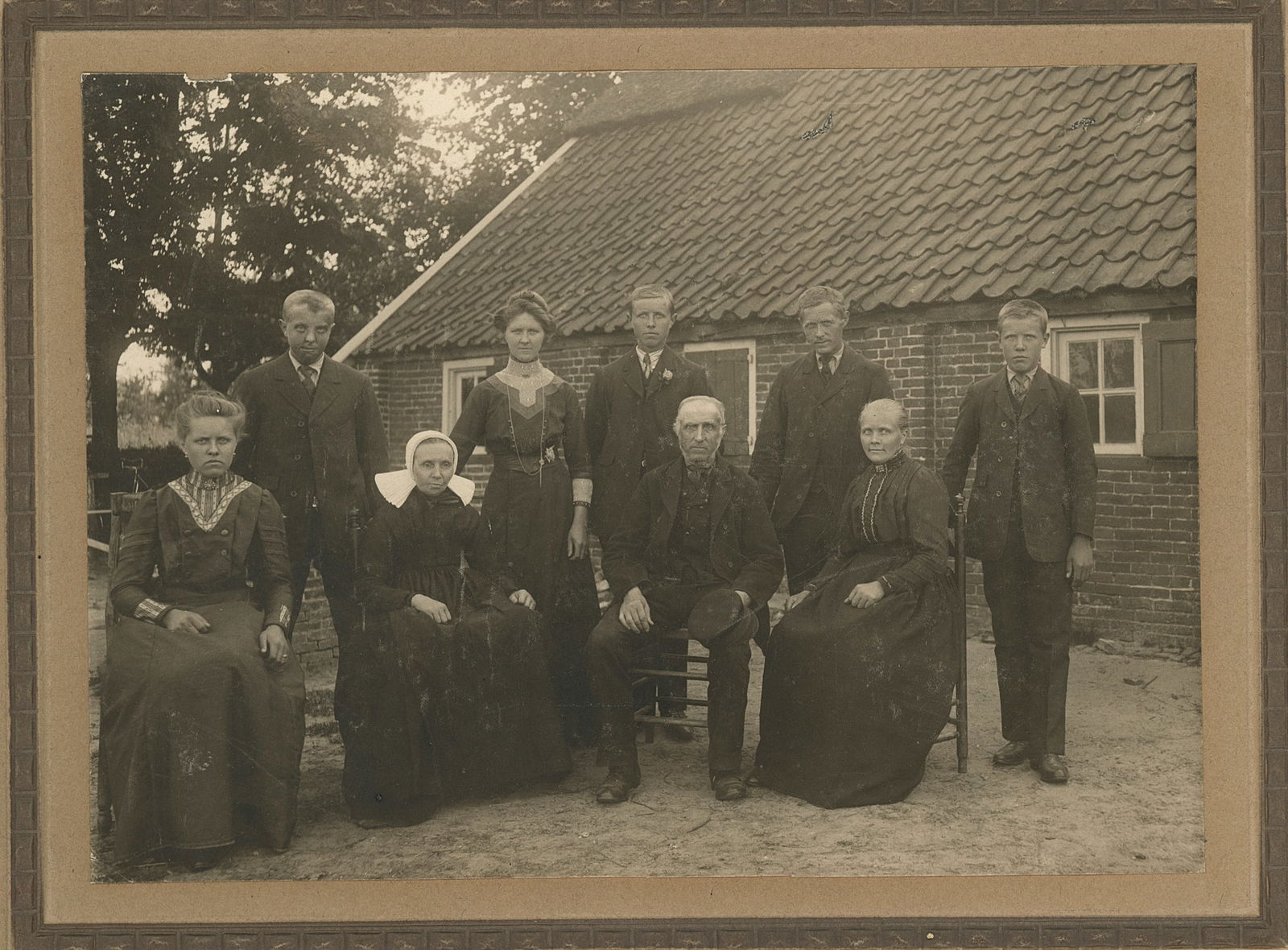 Family Group in Almelo, Eastern Netherlands. c1910: Family Group in Almelo, Eastern Netherlands. C1910. By D. F. BroomGood contrast and tonality. 4.625 x 6.5 in. on 7.25 x 8.75 mount.
