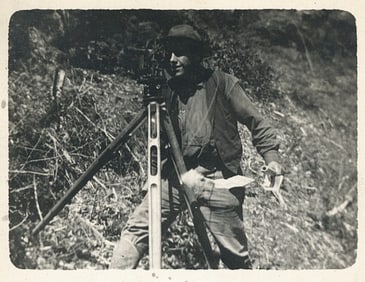 RPPC of a Surveyor with Theodolite. c1920