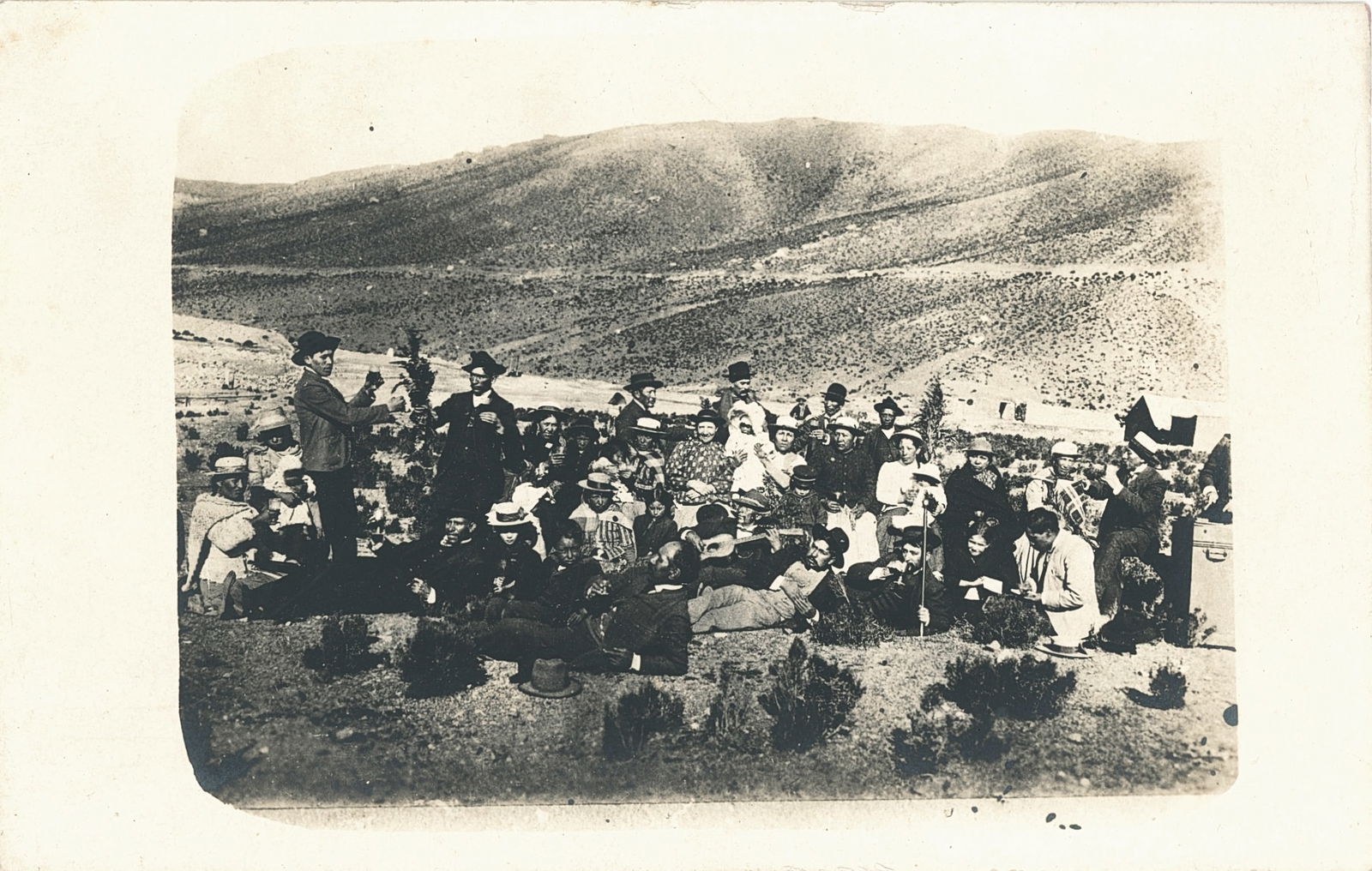 2 Photographs of Peruvian Groups Gathering. C1920.: RPPC of Peruvian Group Gathering. C1920. Image size 2.875 x 4.125 in. With Peruvian Family being pulled on a Railcar by two horses (2)