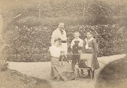 A Man, his Family and his dogs. c1920