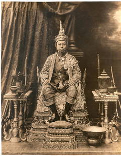 King, Siam. 1911: King Vajiravudh, Rama VI, Siam. C1911. Coronation of King Vajiravudh, Rama VI King of Siam in 1911. Taken onhis throne in the Royal Palace in Bangkok.` produced by the Ewing Galloway Agency c1925. 9.5