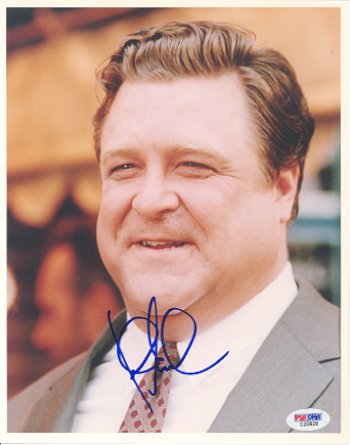 John Goodman Signed 8 x 10 Photo PSA/DNA: 8" x 10" glossy color photograph signed in blue felt tip marker. Obtained in-person and in excellent condition. COA from PSA/DNA.